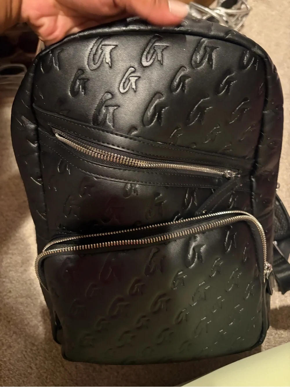 Monogram-Embossed Black Mini Backpack - Sleek Everyday Carry